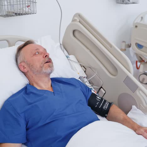 senior man in hospital bed