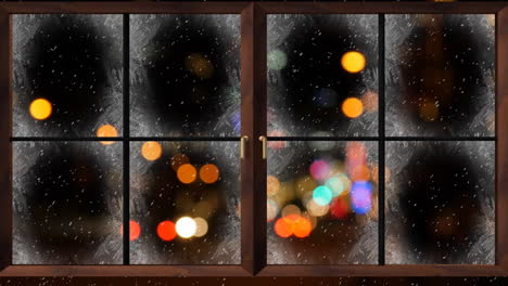 Animation-of-window-over-snow-falling-and-cars-at-christmas