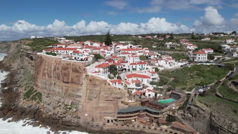 fly above city coast of azenhas do mar portugal 03