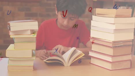 Digital-composition-of-multiple-alphabets-floating-against-boy-reading-a-book-in-library