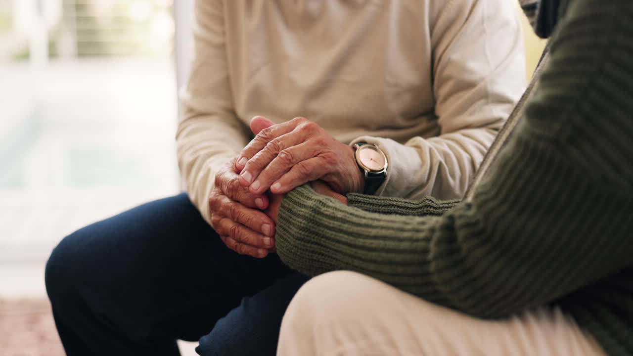 Closeup, holding hands and senior couple