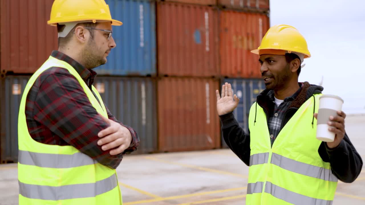 Multiracial industrial people working at shipping containers port terminal - Freight logistics operator