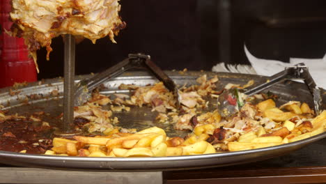 cook fries grilled meat shawarma