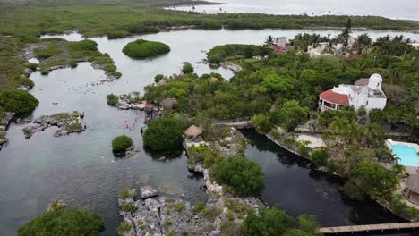 Panoramic-view-of-beautiful-sunset-at-tropical-lagoon-in-Yal-Ku,-Mexico