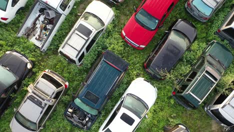 aerial view of a junk yard filled with cars