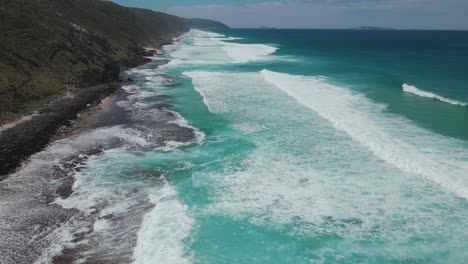 Sandpatch-beach,-Albany,-Western-Australia,-aerial-flying-along-the-beach