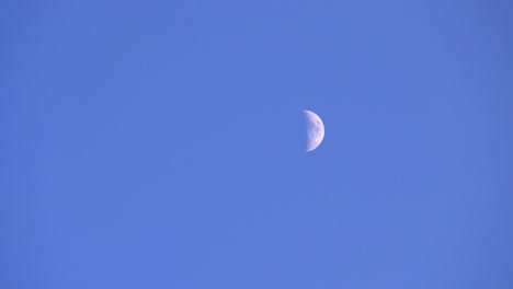 Zoom-Out-Shot-from-the-Moon-Finishes-with-a-Beautiful-Shot-of-Rocky-Mountains-in-the-Foreground