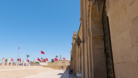 Hassan-Tower-tiltdown-reveal-Al-Hassan-Mosque-courtyard,-Rabat's-historic-gem