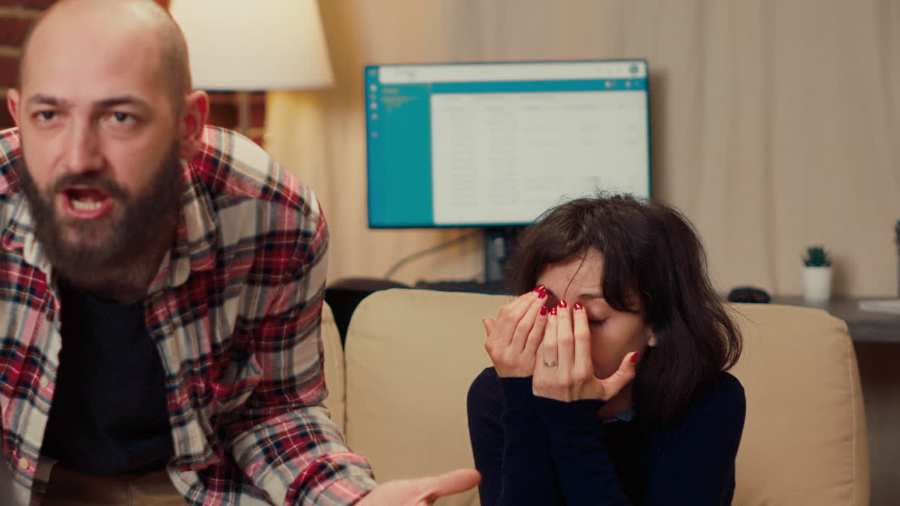 Married couple having argument in psychologist office