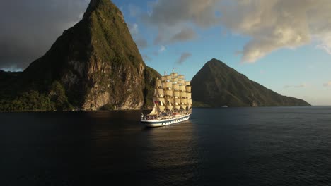 the royal clipper under full sails in front of saint lucia's iconic pitons