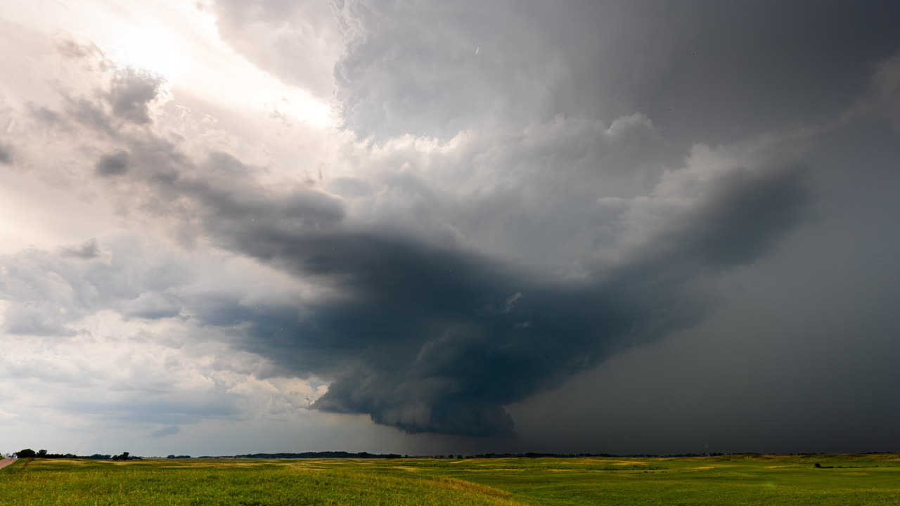 Spinning storm clouds and heavy rain as severe weather approaches