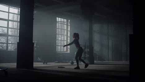 bodybuilder doing crossfit exercise. sportive woman doing squats with lunges