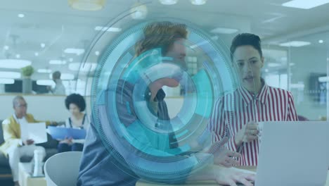animation of scope scanning over diverse business people using laptop in office
