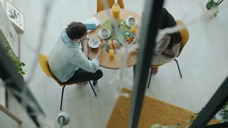 couple enjoying breakfast at home
