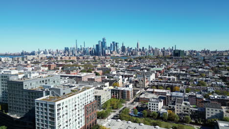 Capture-the-charm-of-Hoboken,-NJ,-with-a-drone-push-shot-featuring-the-iconic-New-York-City-skyline