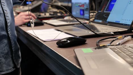 hands of a video technician in the production of a live broadcast