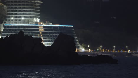 night view of a hotel on the coast