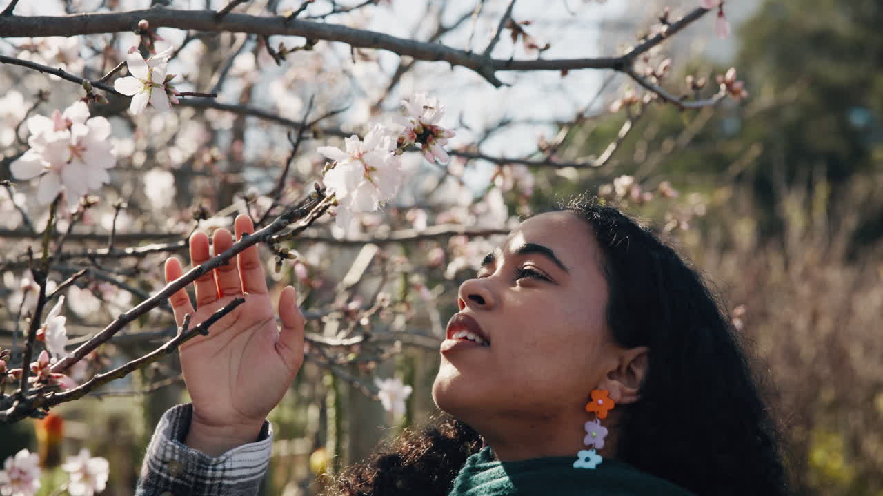 Woman Enjoying Almond Blossoms in Spring