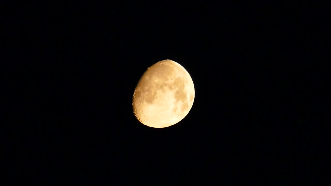 phases of the moon - bloated moon,night bloated moon,yellow toned bloated moon, 4k video,