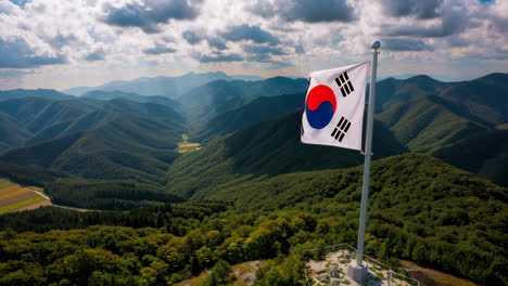 South Korean Flag Flying High Above Mountains