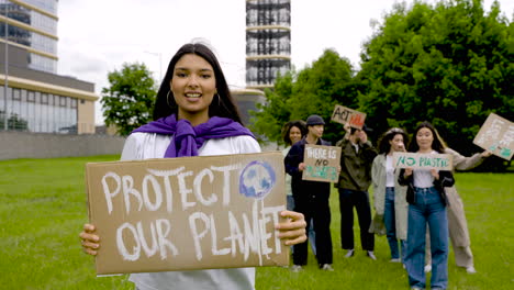 group of  people in a protest with megaphones and placards 5