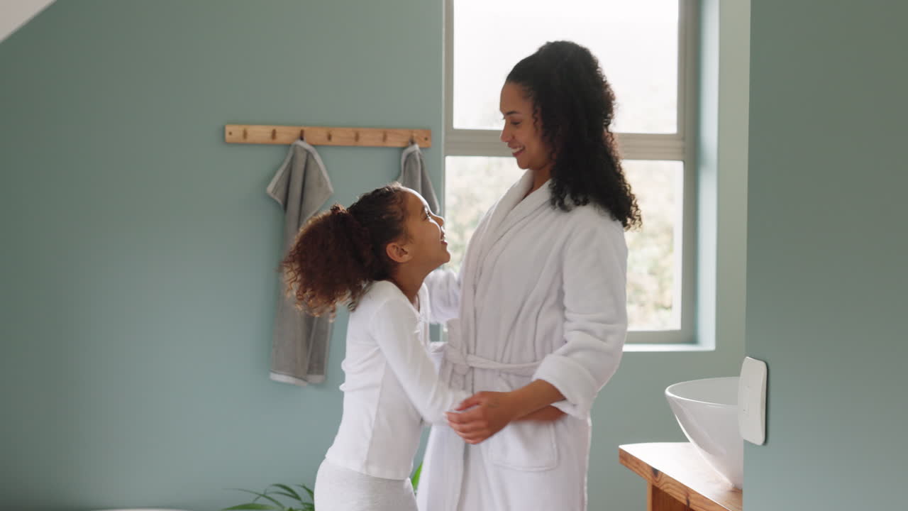 Mother and Daughter Bonding in Bathroom