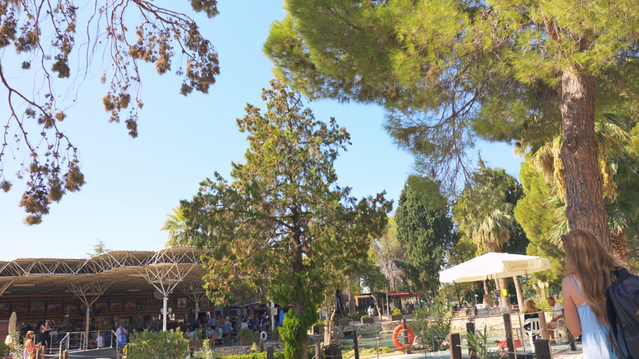 Stunning video of a Cleopatra's Pool in Pamukkale, known for its healing waters and ancient columns within.