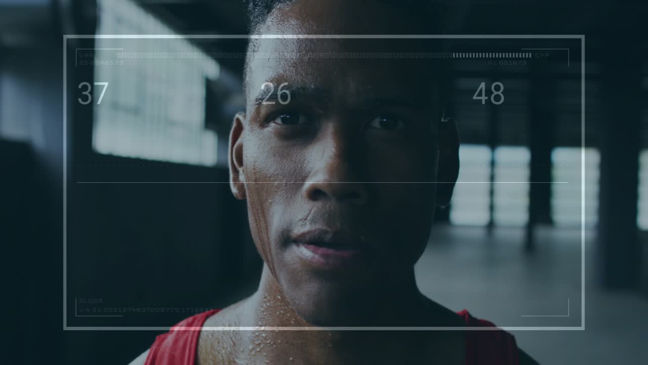 Camera shifting upward male athlete breathing in red tank HUD overlaying metrics tracking fitness