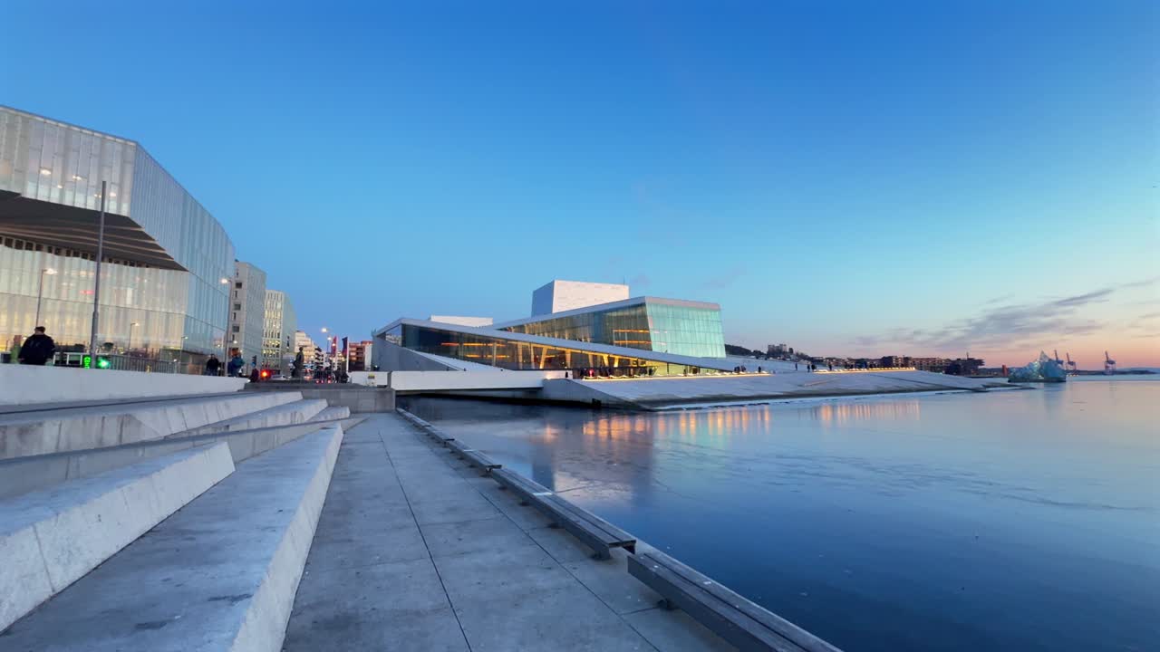 Oslo library Opera House Norway Operahuset Norge aerial drone Norwegian Inner Oslo Fjord arctic vibrant golden hour sunset cityscape sauna icy frozen sea ocean breeze Munch Museum skybar pan right
