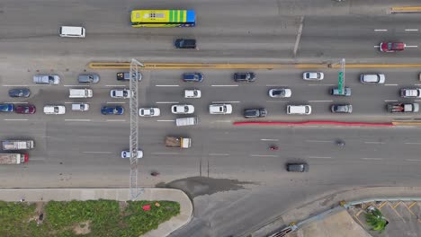 construction of the kilometer 9 of the duarte highway in santo domingo, dominican republic. traffic jam scene at rush hour aerial top shot.
