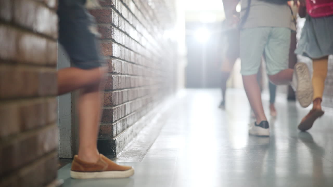 Children walking in a school hallway