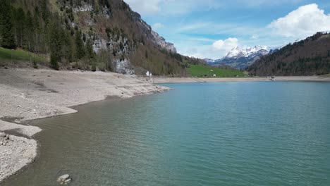 forward view of alpine lake inside the mountains