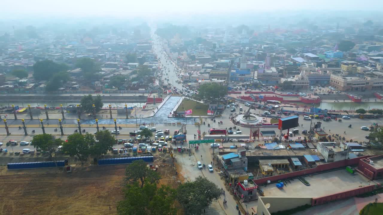 Aerial View of a Busy City in India with a Canal