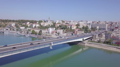 fantastic 4k aerial orbiting shot of branko bridge, sava river in belgrade, summer day