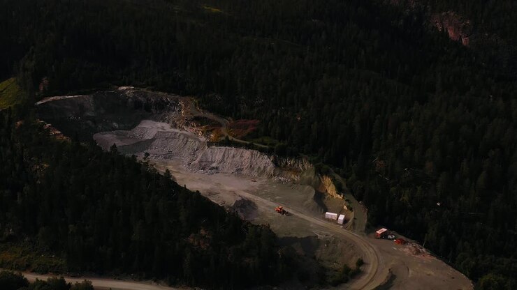 Aerial view around a quiet quarry site, sunny, summer day in Central Norway