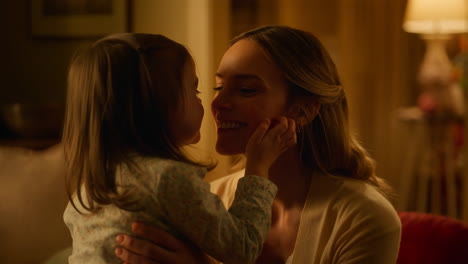 mother and daughter sharing a loving kiss