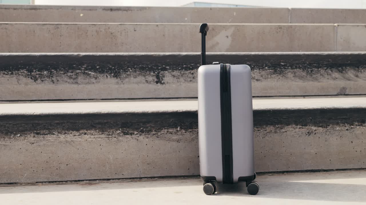 Tourist man with suitcase baggage in spain, A traveler with luggage suit jacket on business street go to a hotel, business office, airport terminal, enjoying the vibrant atmosphere