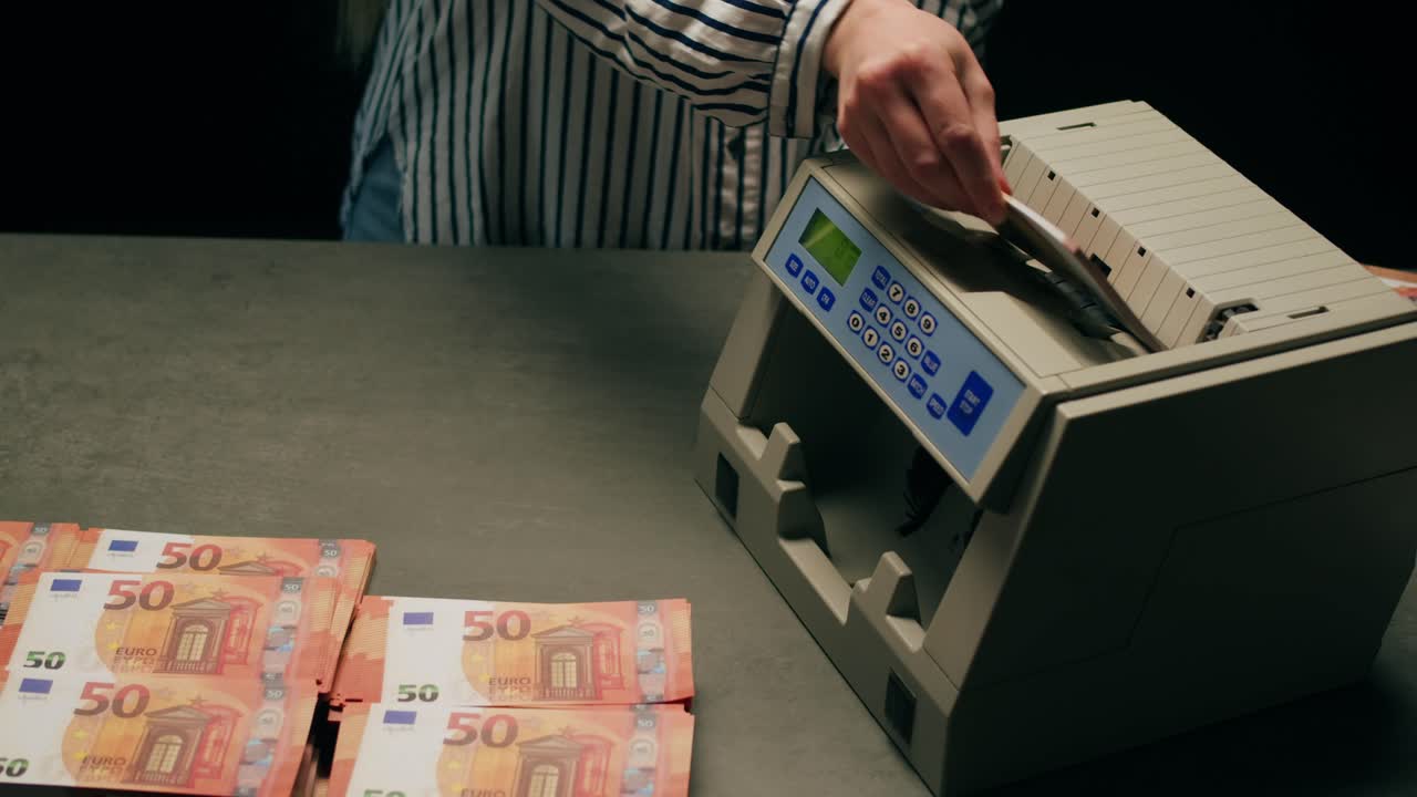 Specialised police officer Counting dollar banknotes in crime lab, conceptual image. High quality 4k footage
