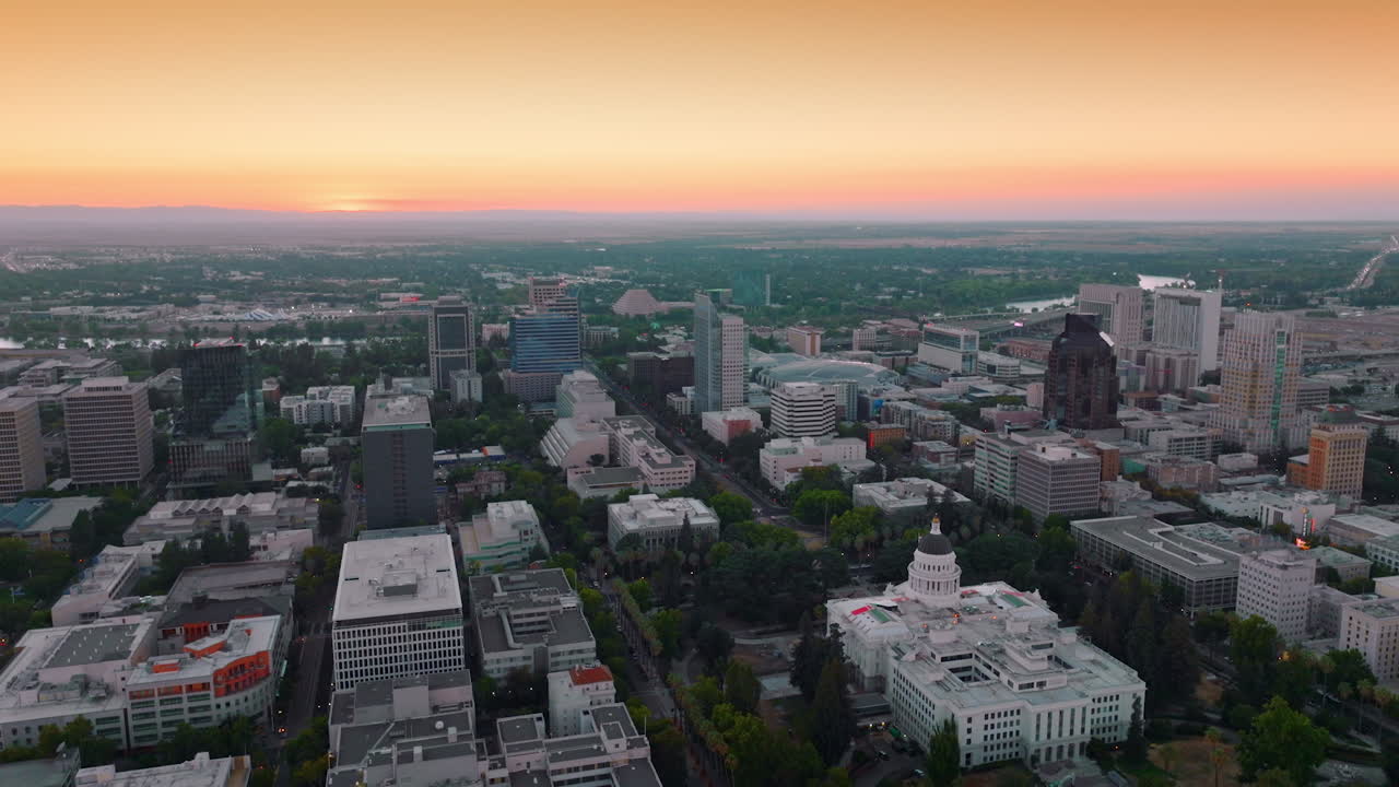 Urban scenery of beautiful city at sundown. Lovely view of Sacramento, California, USA from aerial perspective.