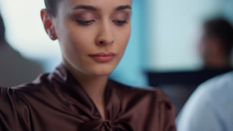 pensive businesswoman working in office