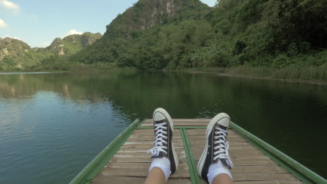 Tourist-having-water-travel-in-Trang-An-Vietnam