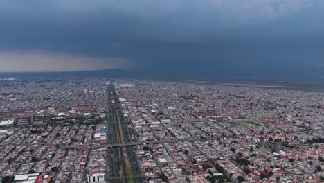 heavy rain approaching the valley of mexico, announced by a lightning storm in drone footage