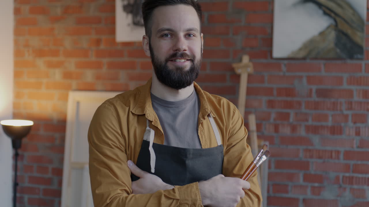 Portrait of a Smiling Artist in His Studio