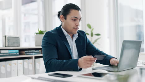 Business,-man-and-credit-card-at-laptop