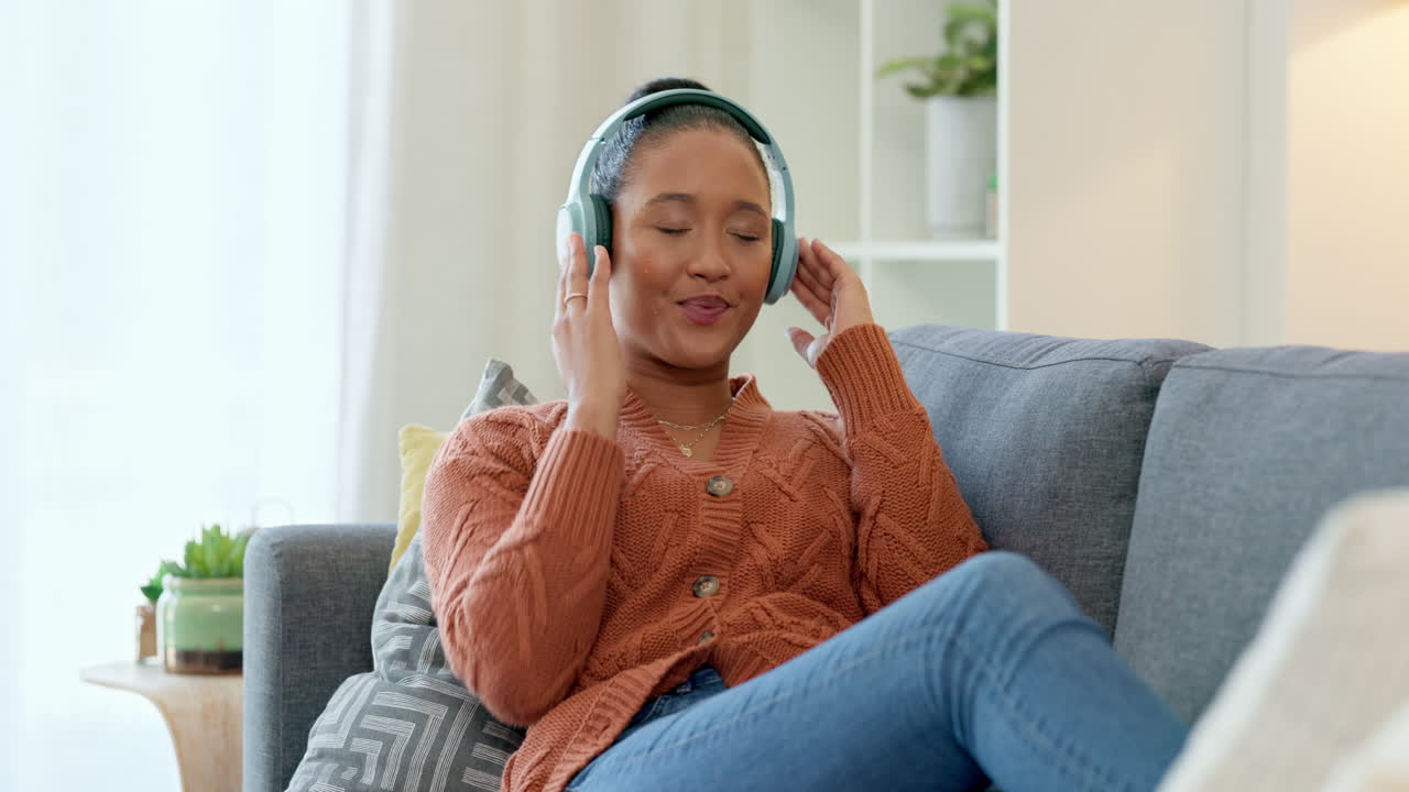 Woman listening to music with headphones