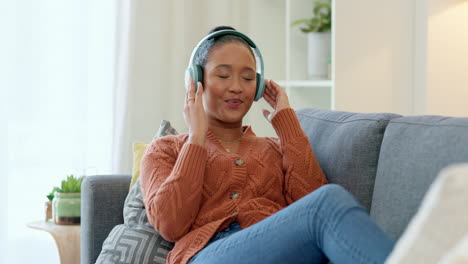 woman listening to music with headphones