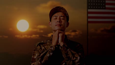 praying soldier at sunset