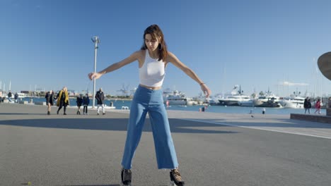 woman roller skating in a city harbor