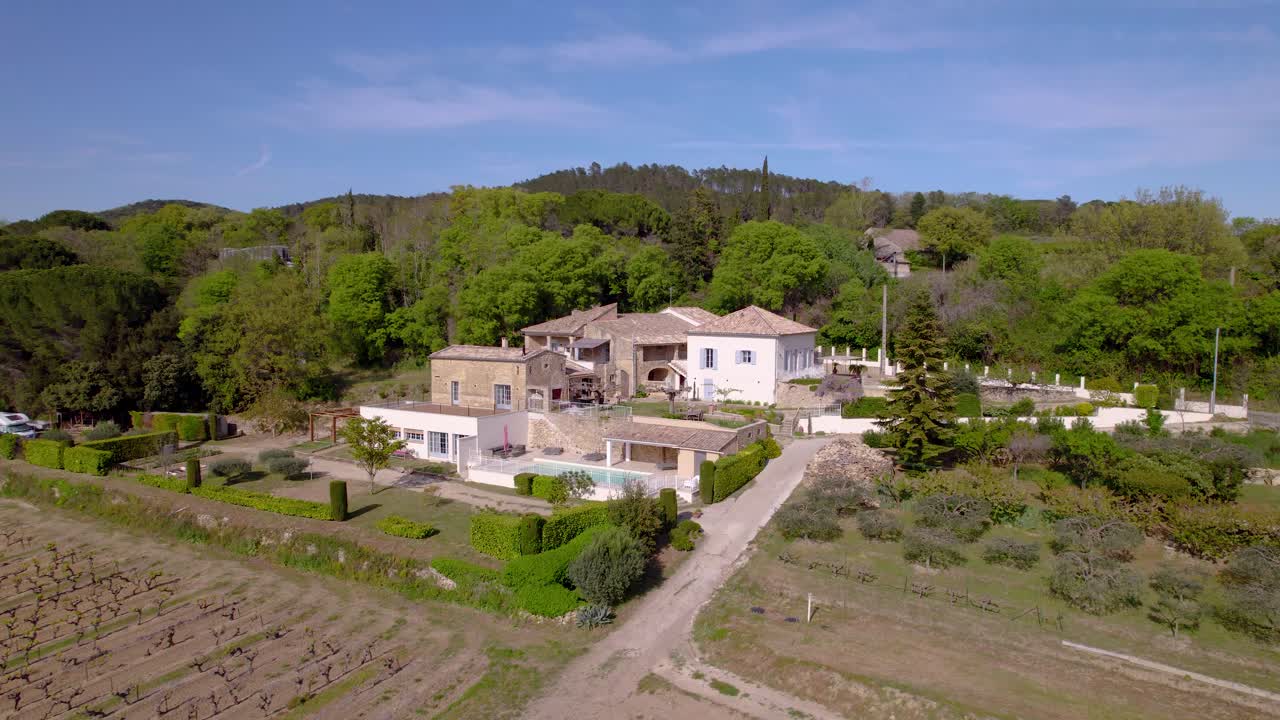 Aerial shot of a winery owners private villa with pool beside their vineyard