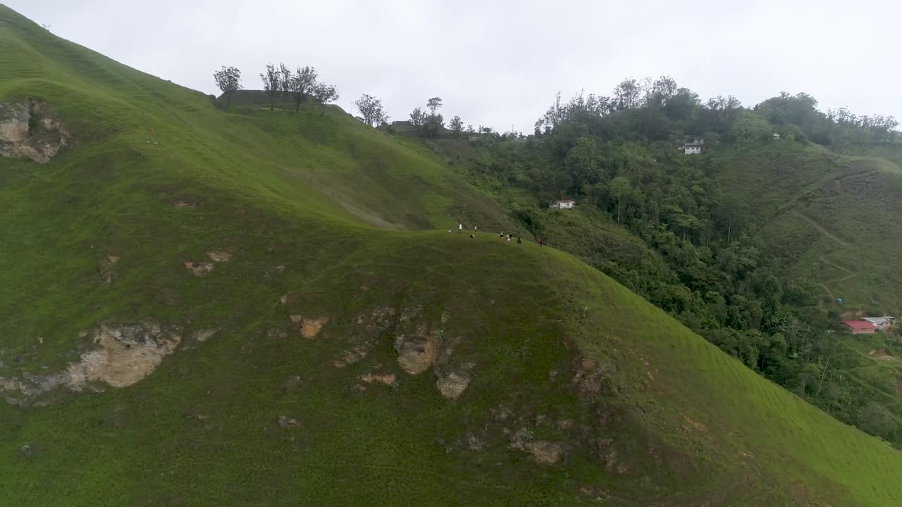 People enjoy high mountain view sit on top, aerial turn over Jarillo Venezuela